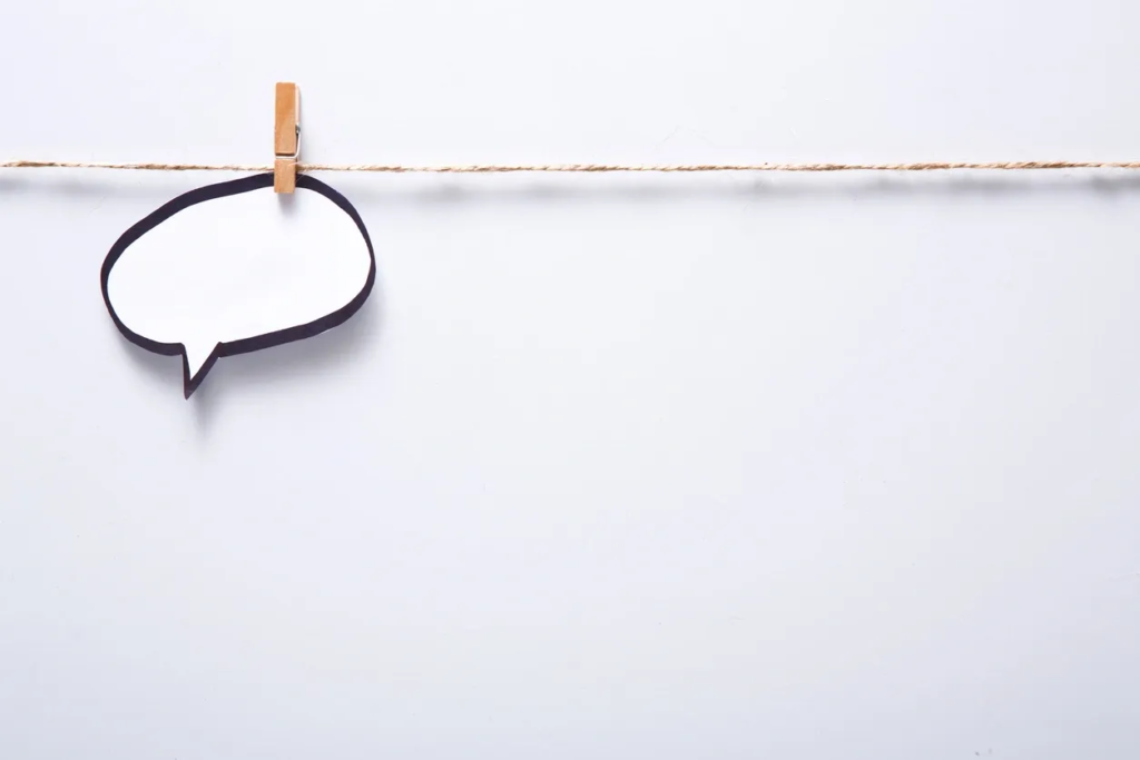 A speech bubble on a string representing getting in contact by sending me a message.